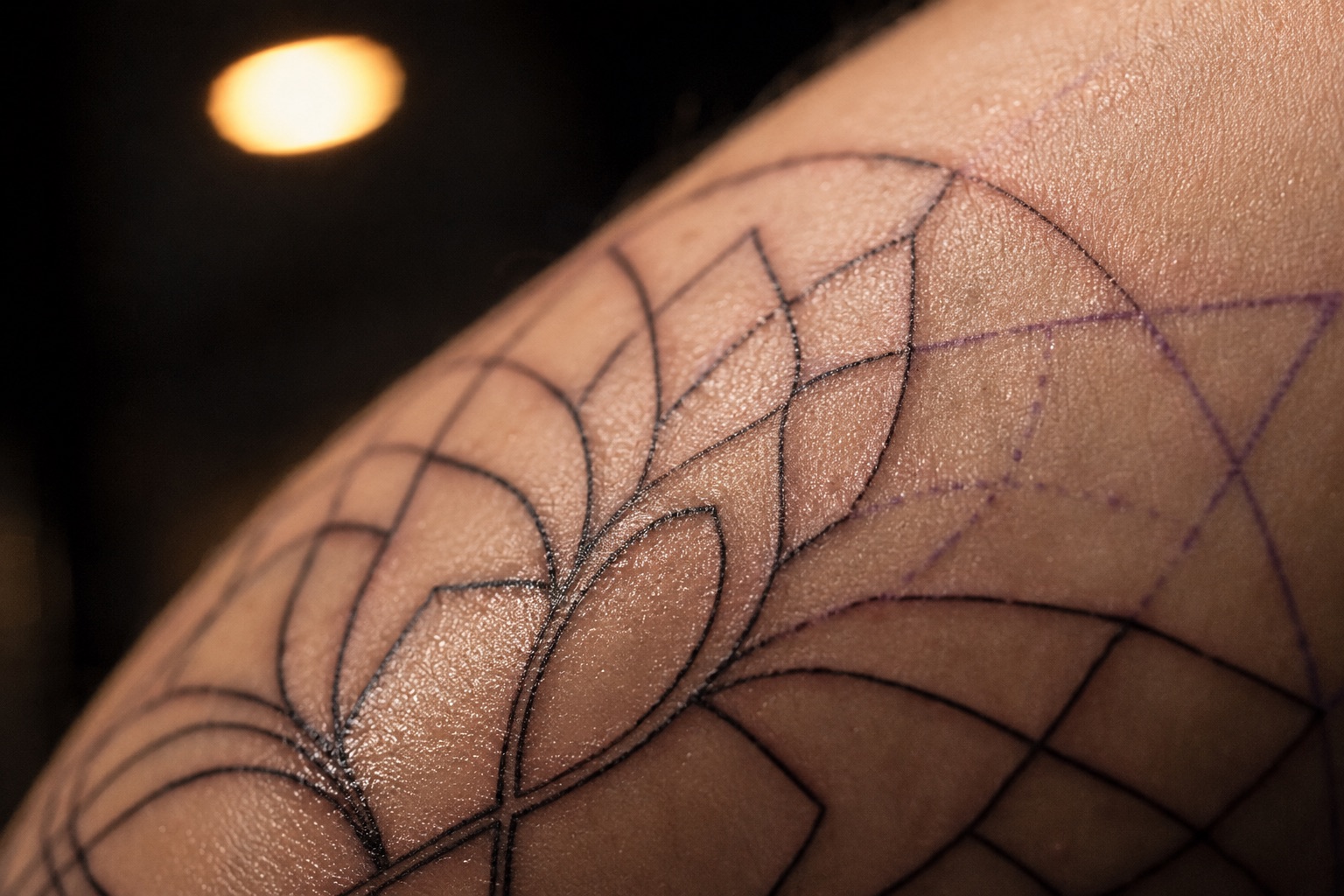 Close-up of detailed tattoo linework